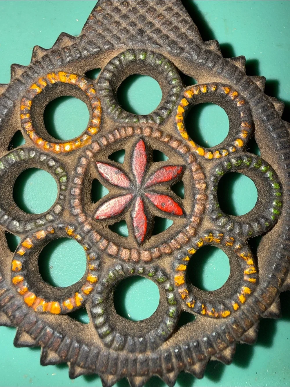 Decorative Cast Iron Trivet with Red Star Accent for Tabletop